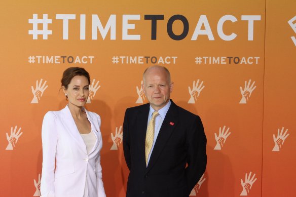 Angelina Jolie and Foreign Secretary William Hague at the Global Summit to End Sexual Violence in Conflict. CC BY 2.0 Foreign and Commonwealth Office