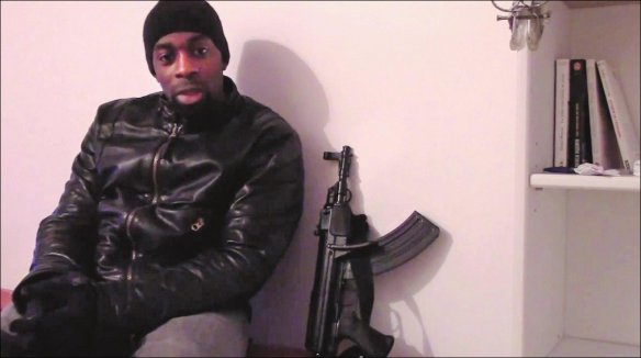 One of the killers, Amedy Coulibaly, posed next to a firearm in a video; and it has been identified as a Czech made Czech VZ-58 carbine. If that’s correct and it was fully automatic then he couldn’t have purchased it legally in France. Screenshot from video.