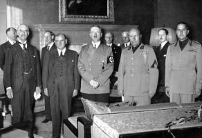 From left to right, Chamberlain, Daladier, Hitler, Mussolini and Italian Foreign Minister Count Ciano as they prepare to sign the Munich Agreement. Photo: Bundesarchiv