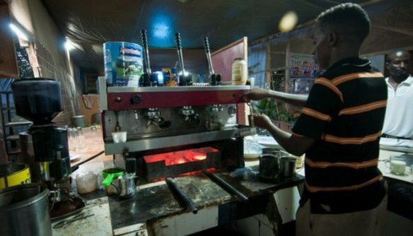 Living in a recovering failed state like Somalia means being innovative. At The Village Restaurant, a popular open-air hangout for Mogadishu's returning diaspora community, a charcoal-powered Italian espresso machine brews Somalia's best cappuccino. Photo: BBC