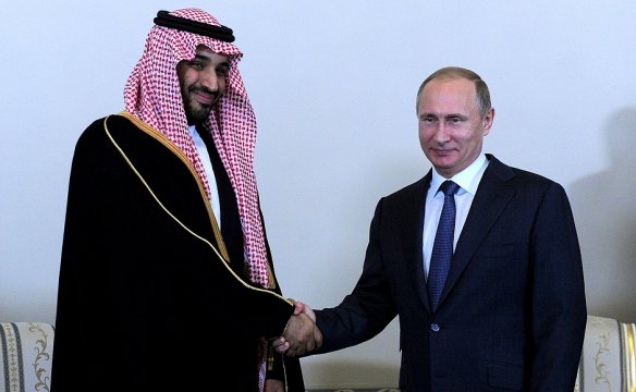 Not very sincere smiles: Putin meeting with Prince Mohammed bin Salman at the St. Petersburg economic forum last month.