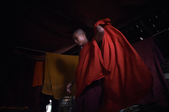 A Buddhist monk adjusts his robe at a monastery affiliated with the Ma Ba Tha (Organization for the Protection of Race and Religion) on the outskirts of Yangon. The Ma Ba Tha organization, mainly active in Yangon and the northern city of Mandalay, promotes hardline Buddhist nationalism in Myanmar.