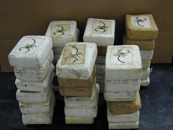 Bricks of cocaine, a form in which it is commonly transported. Wikimedia Commons.