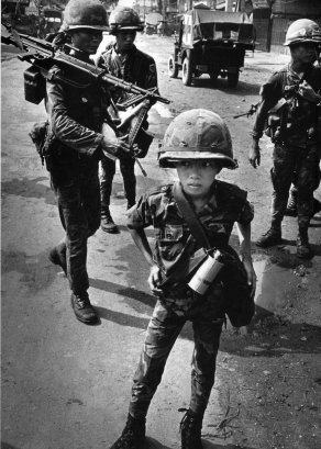 Child soldiers are not a new phenomenon - Ten year old South Vietnamese soldier. Photo: Philip Jones Griffith